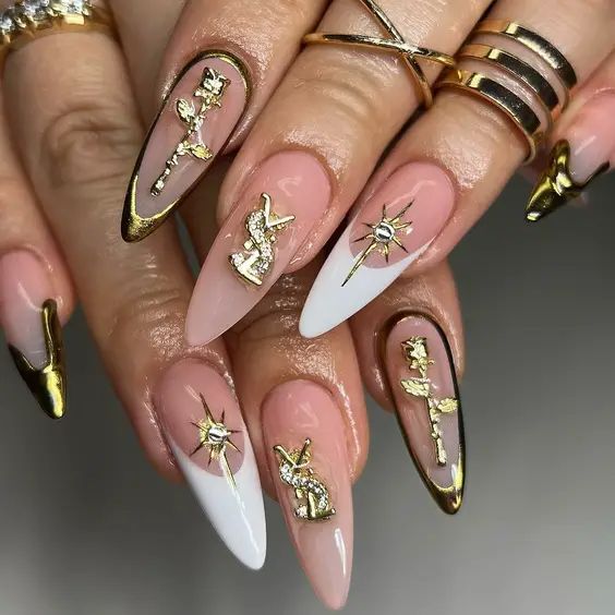 Luxurious Golden Embellishments on Nude Almond Nails